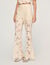 Guipure lace trousers